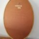 Large oval mirror gilded wood with red plate 44x66cm