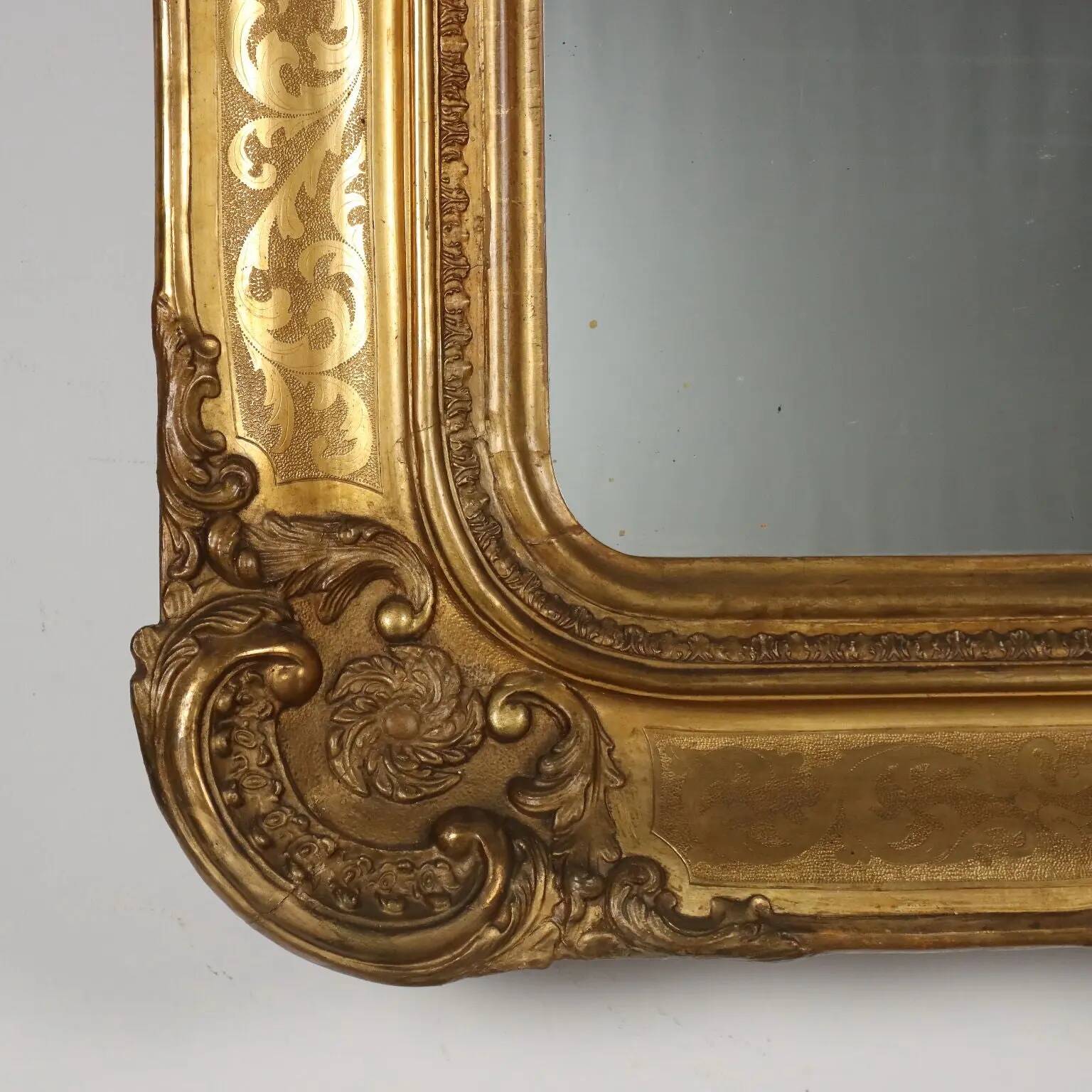 Antique mirror in carved fir, France, mid-19th century.