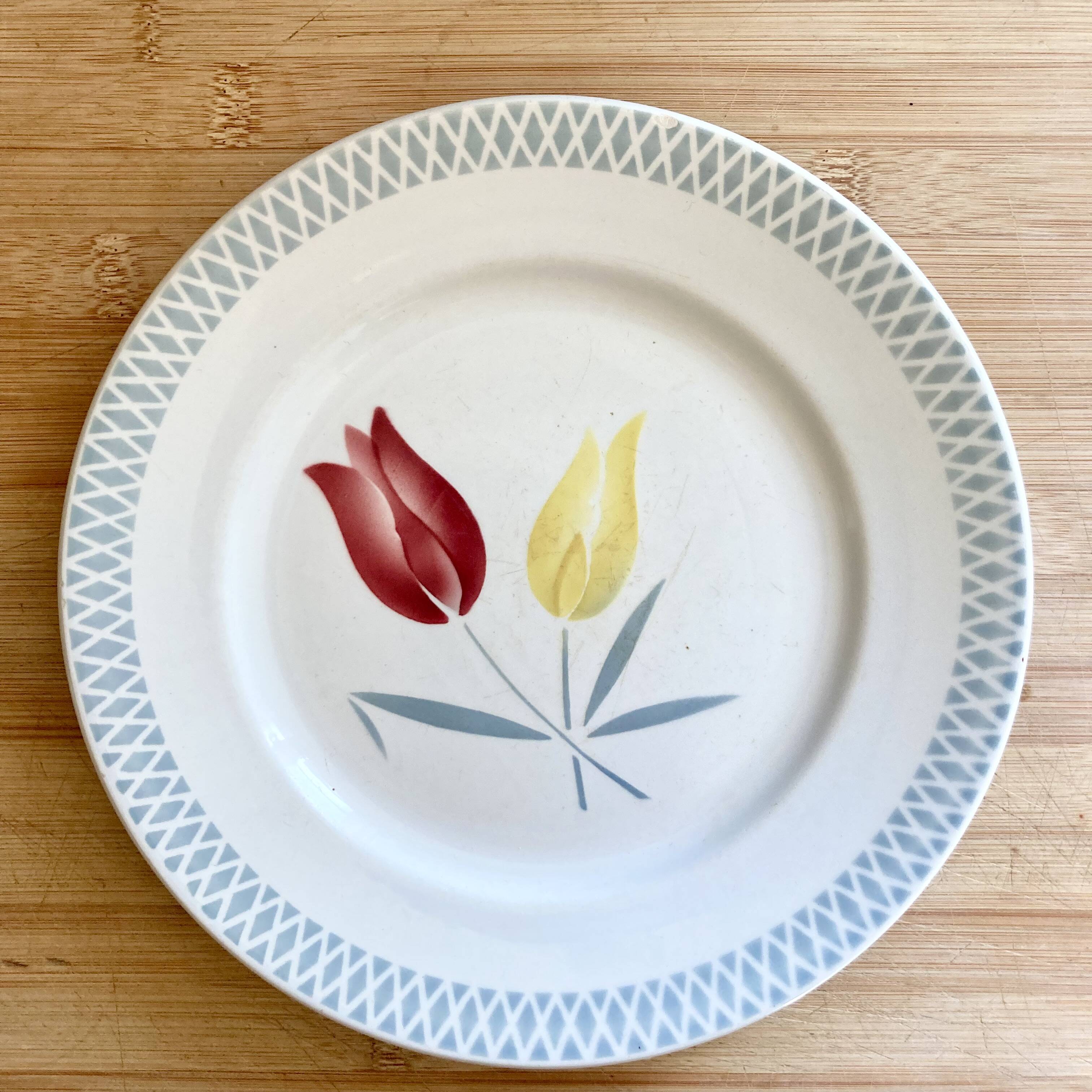 8 mismatched old plates