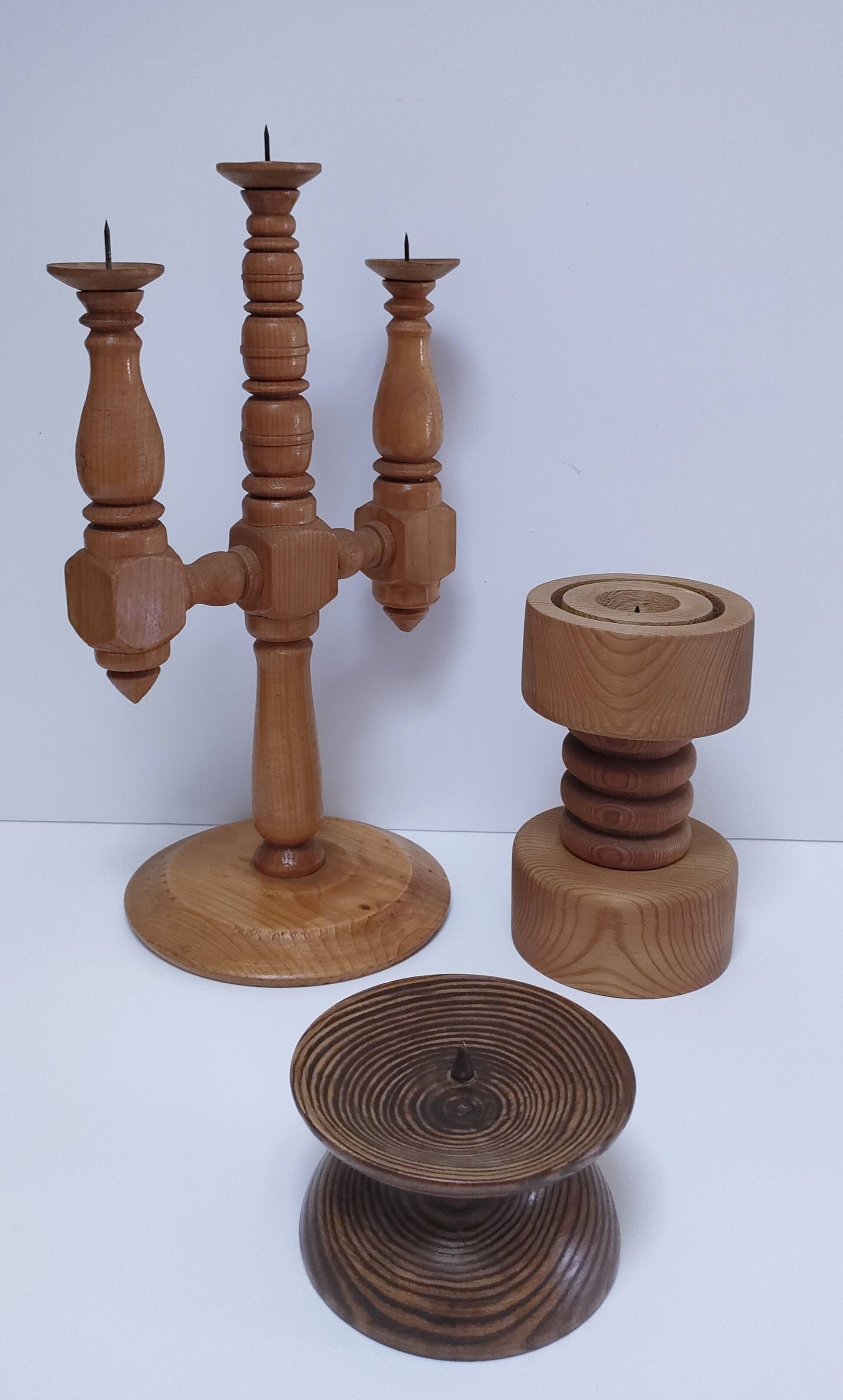 Three Scandinavian wooden candle holders, vintage design