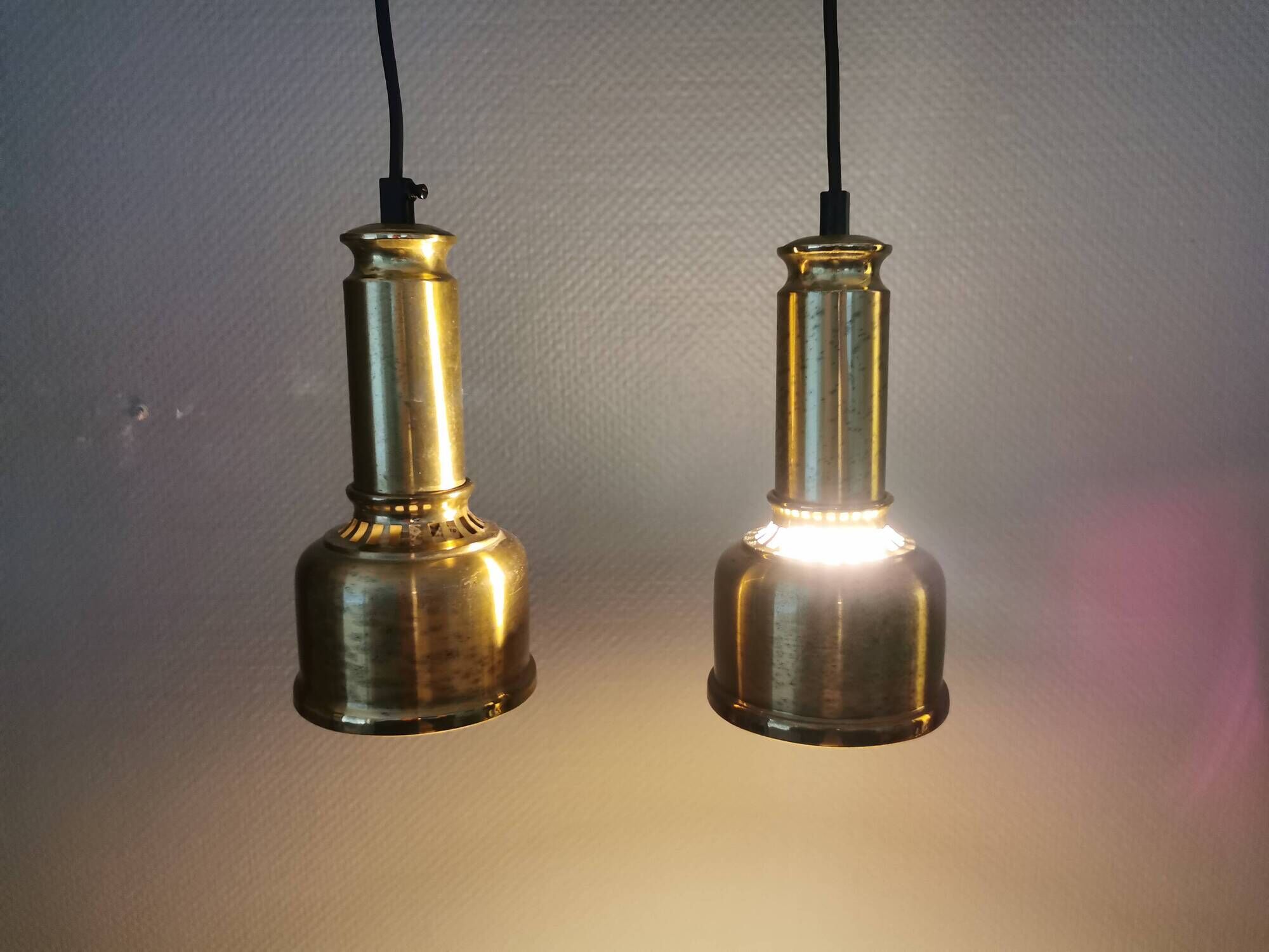 Two beautiful perforated brass hanging lamps, Danish and from the 1980s.