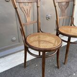 Pair of curved wooden bistro chairs
