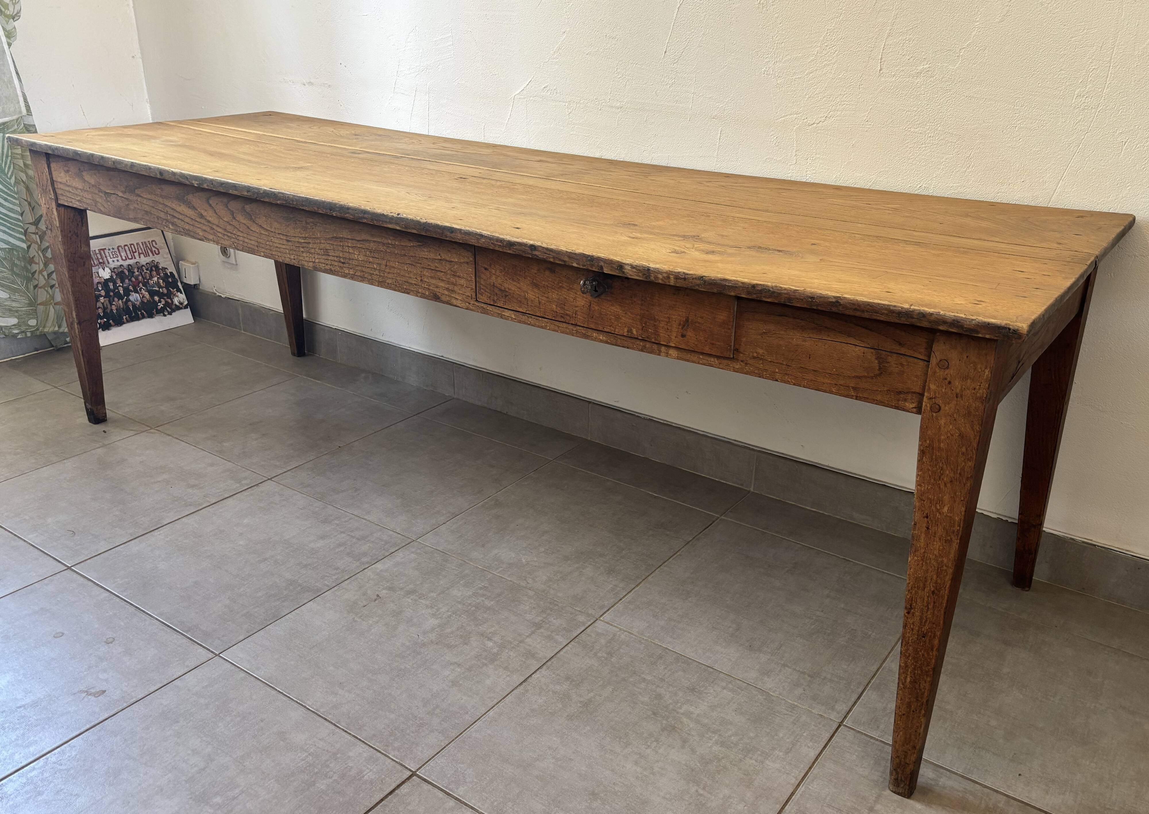 Authentic vintage farmhouse table from the 1950s in solid oak.
