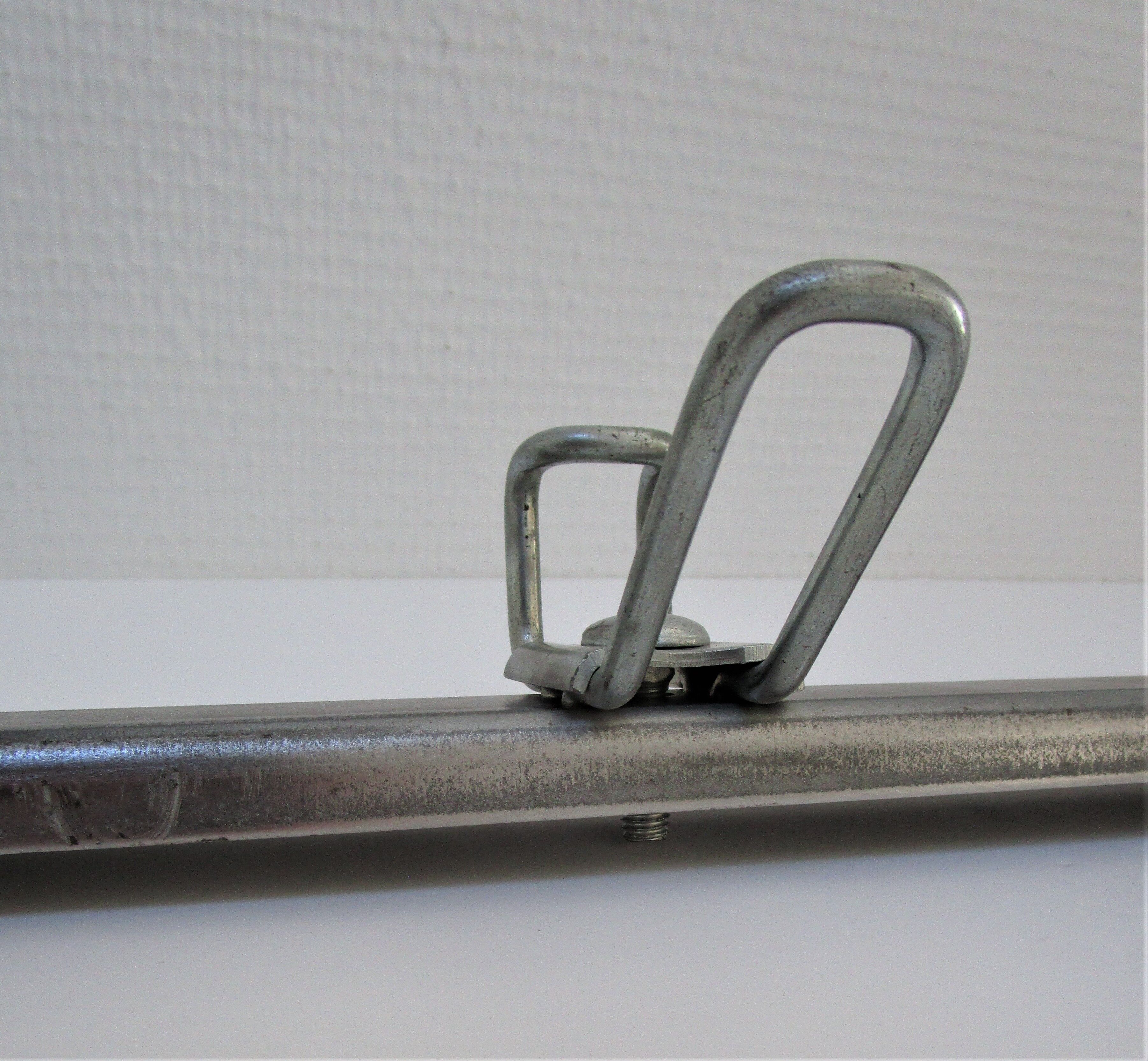 Vintage school wall rack in patinated steel