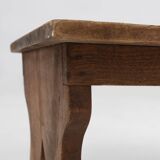 Small rustic wooden stool with curved base, France ca. 1900
