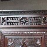 Carved oak bonnet maker, late 19th century
