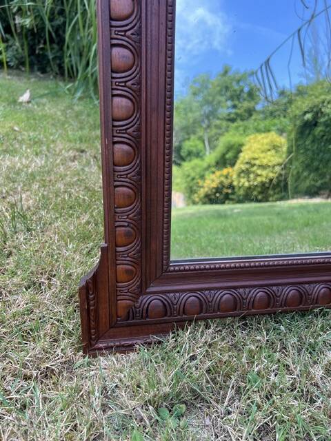 Antique carved wooden mirror