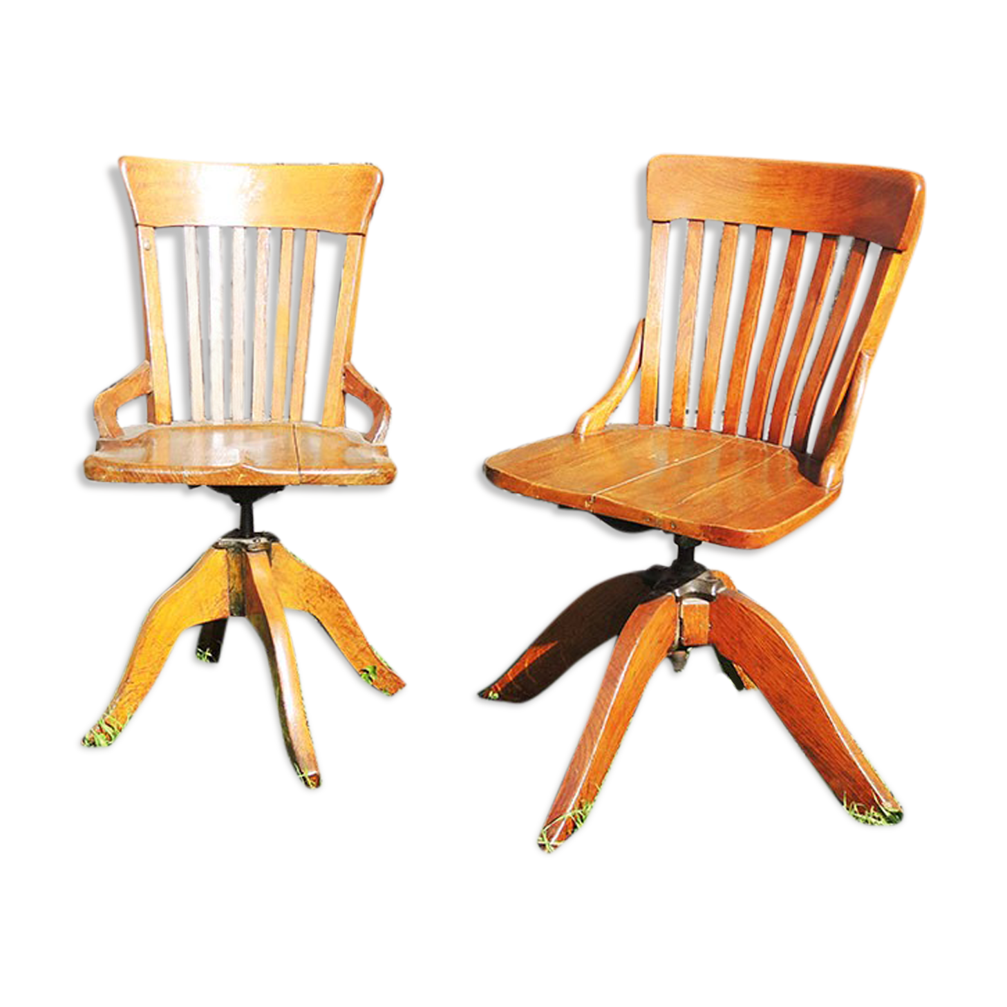 2 old swivel office chairs in solid wood