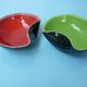Set of two-colored red and green ceramic cuts on a black background