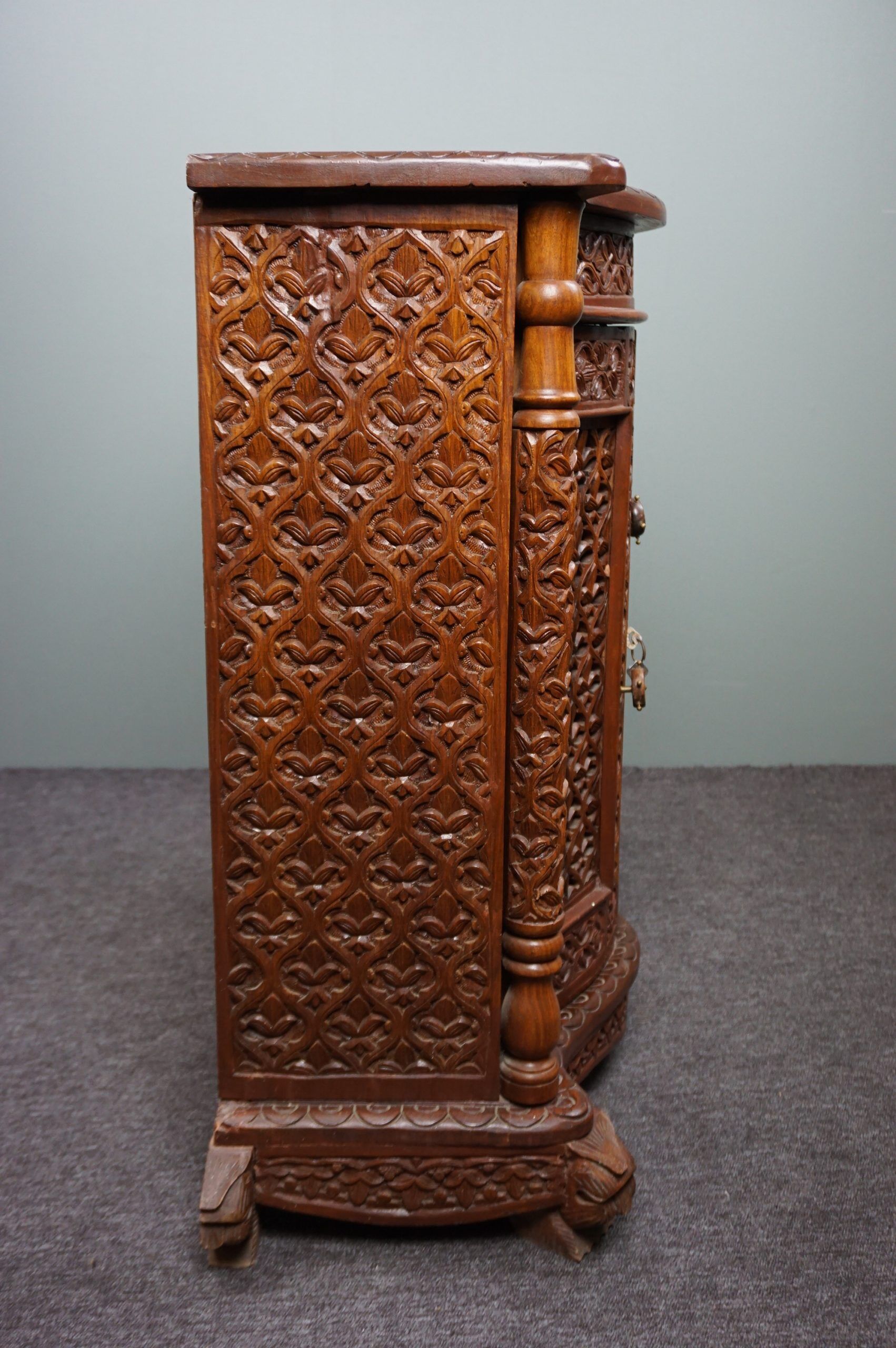 Carved wooden cabinet from the mid-20th century