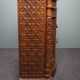 Carved wooden cabinet from the mid-20th century