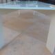 Long modern coffee table in glass and off-white metal - as new.