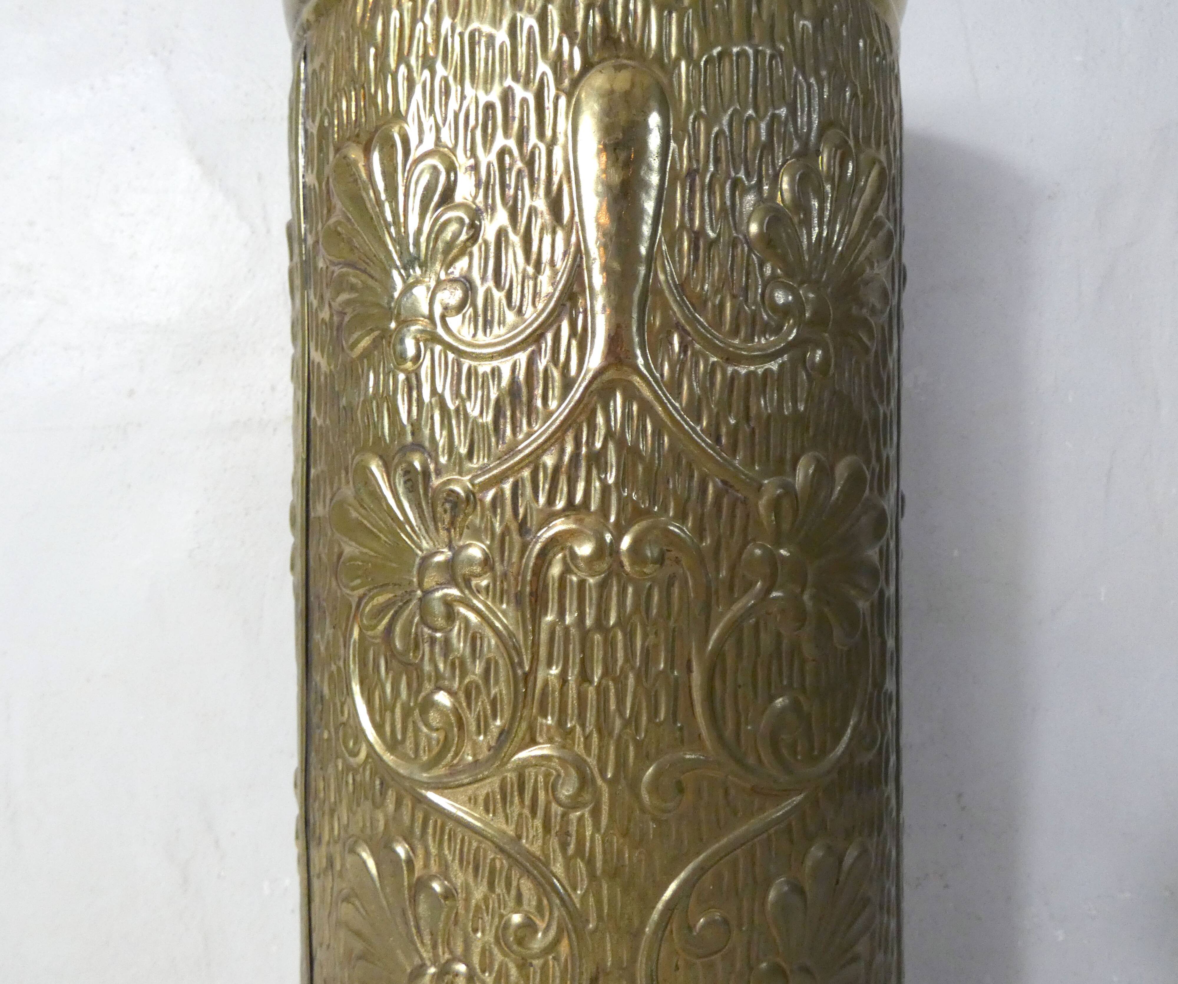 Old brass umbrella stand