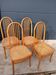 Set of 4 vintage Baumann chairs in honey wood and cane.
