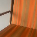 Old foldable beach seat in wood and canvas for children