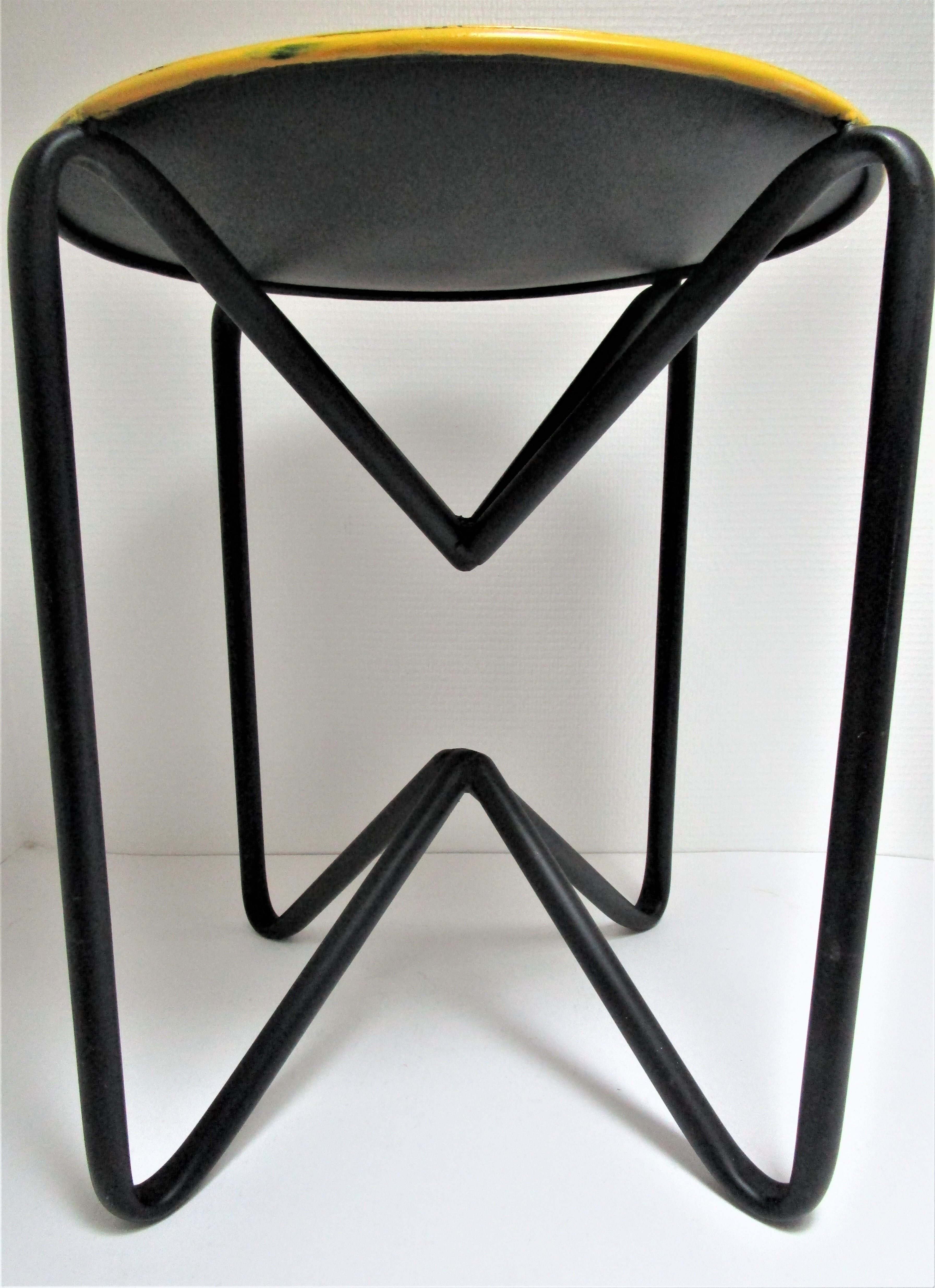 Yellow and black metal stool design 90s