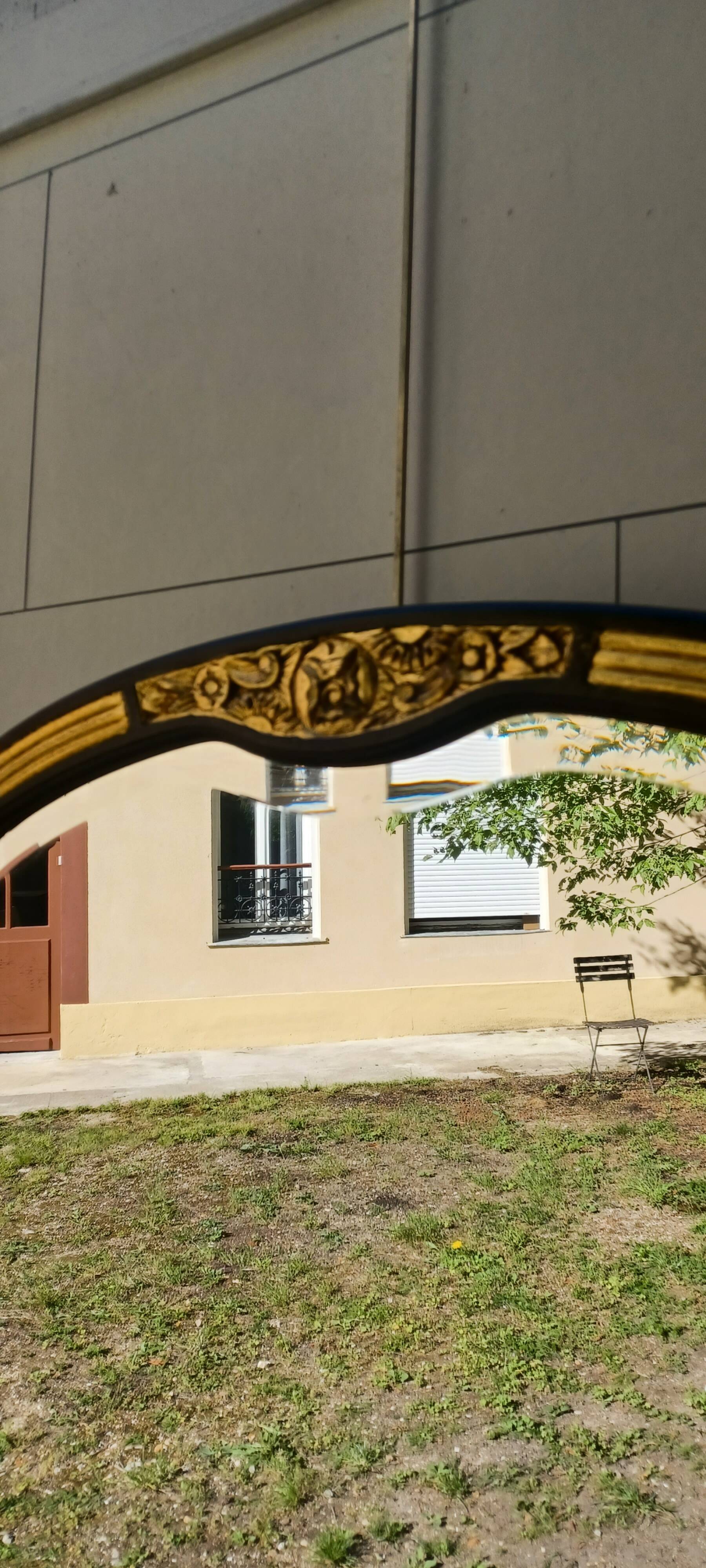 ART DECO BLACK AND GOLD MIRROR (1925-1945)