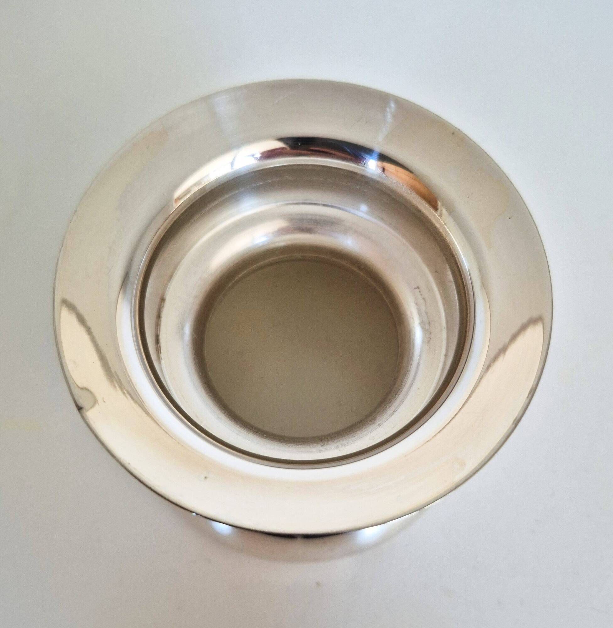 Antique silver candle holder.