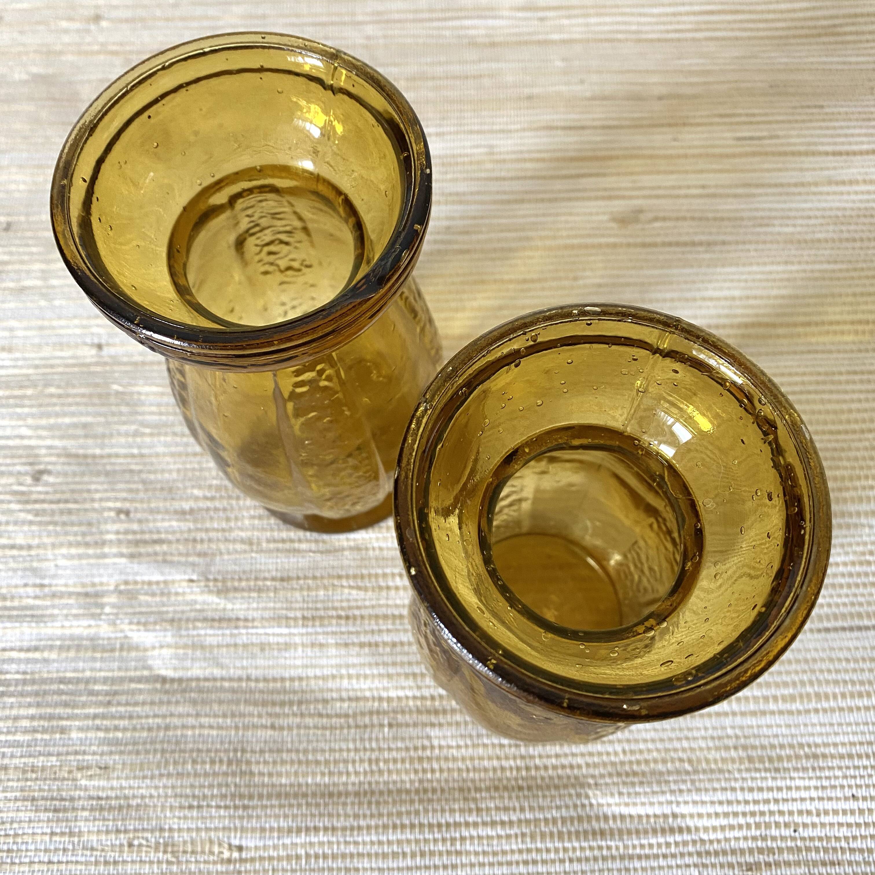 Paire de vases à jacinthe en verre ambré bullé