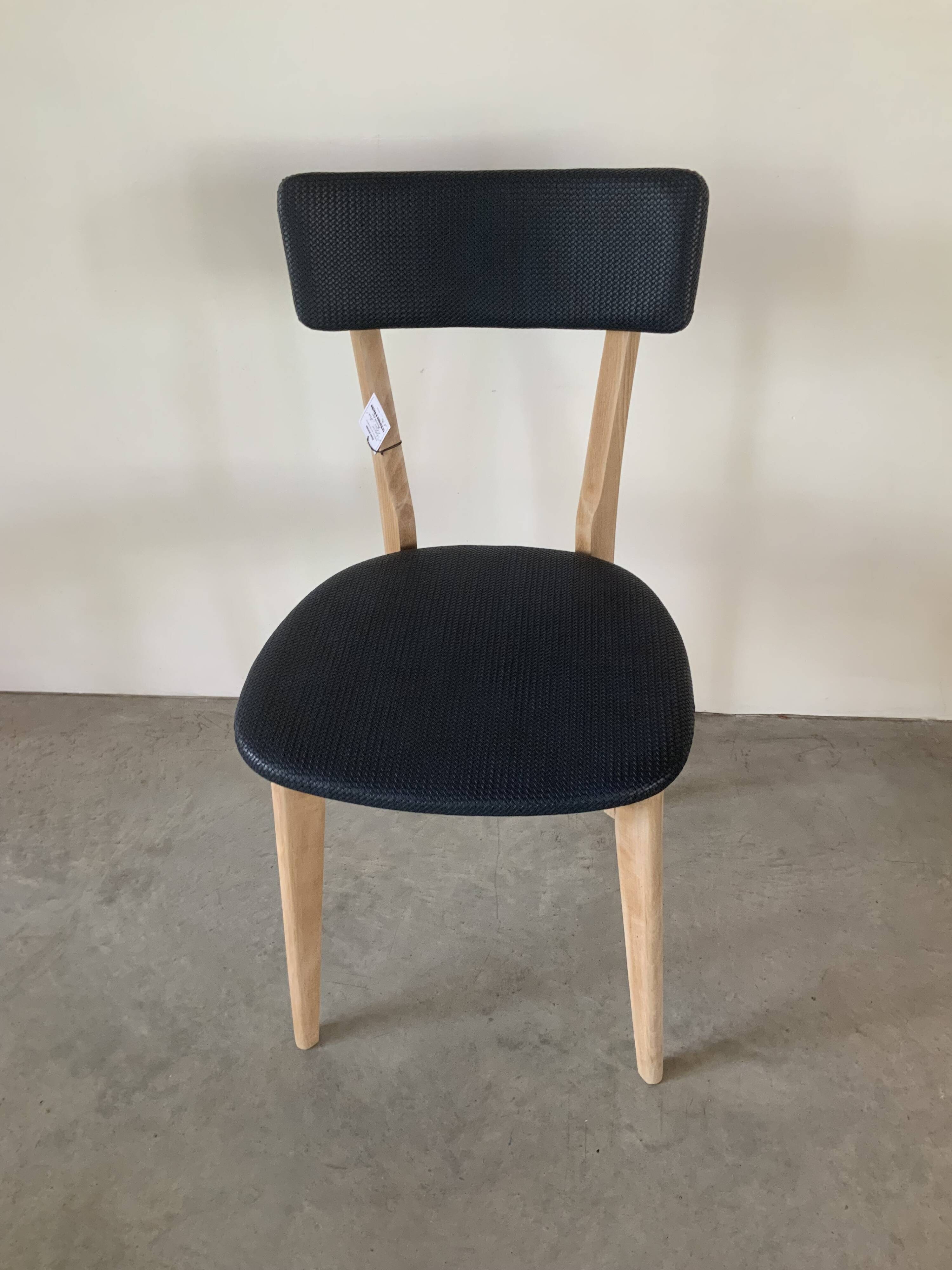 Restored vintage chair in midnight blue vinyl from the 50s