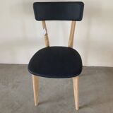 Restored vintage chair in midnight blue vinyl from the 50s