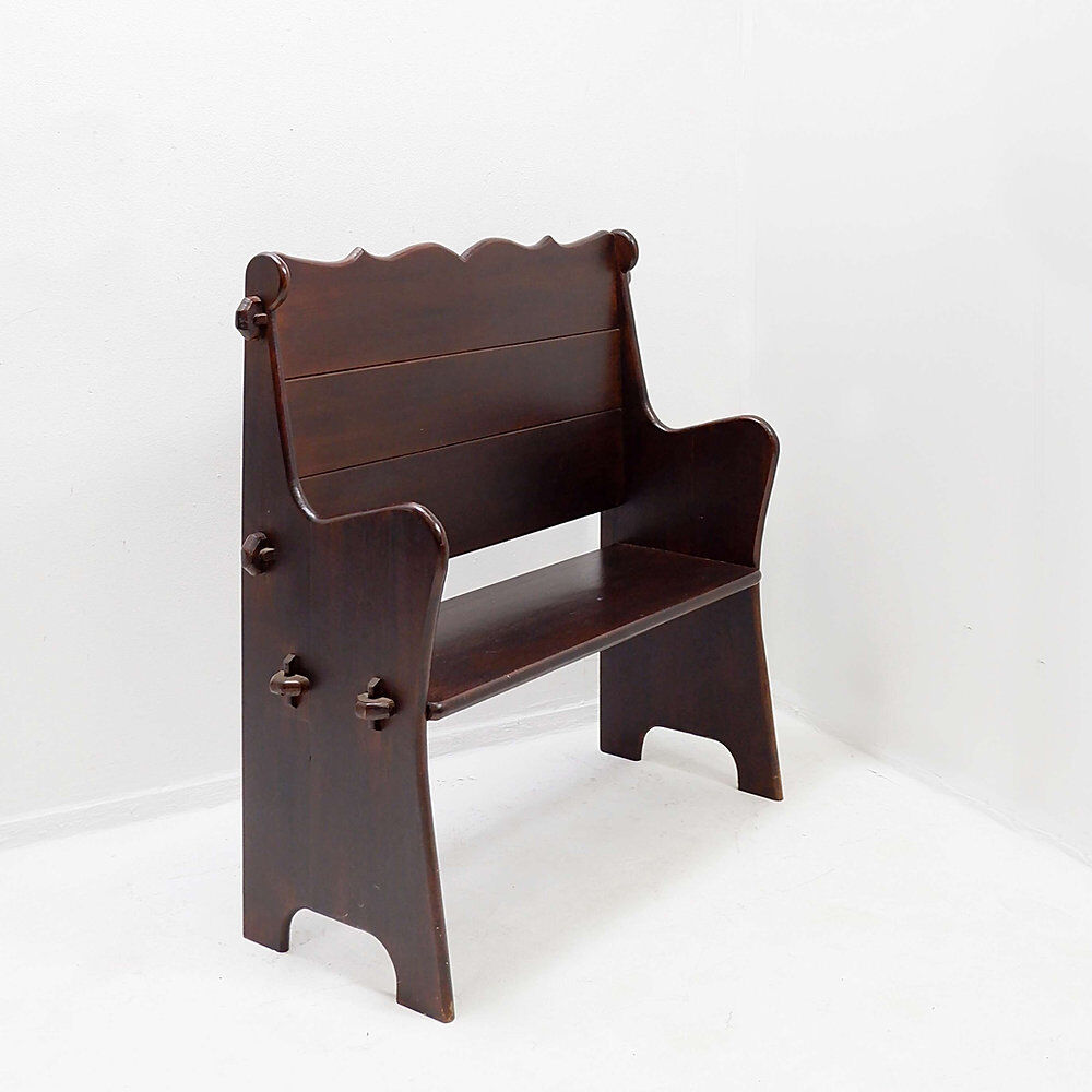 Vintage solid wood church bench from the 20th century.