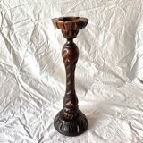 Old ashtray on carved wooden stand