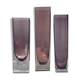Set de trois vases en verre violets