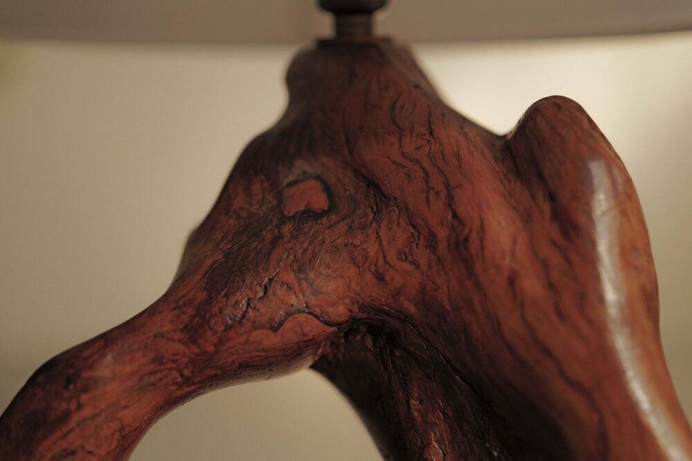 Sculptural lamp made of olive wood, around 1960.