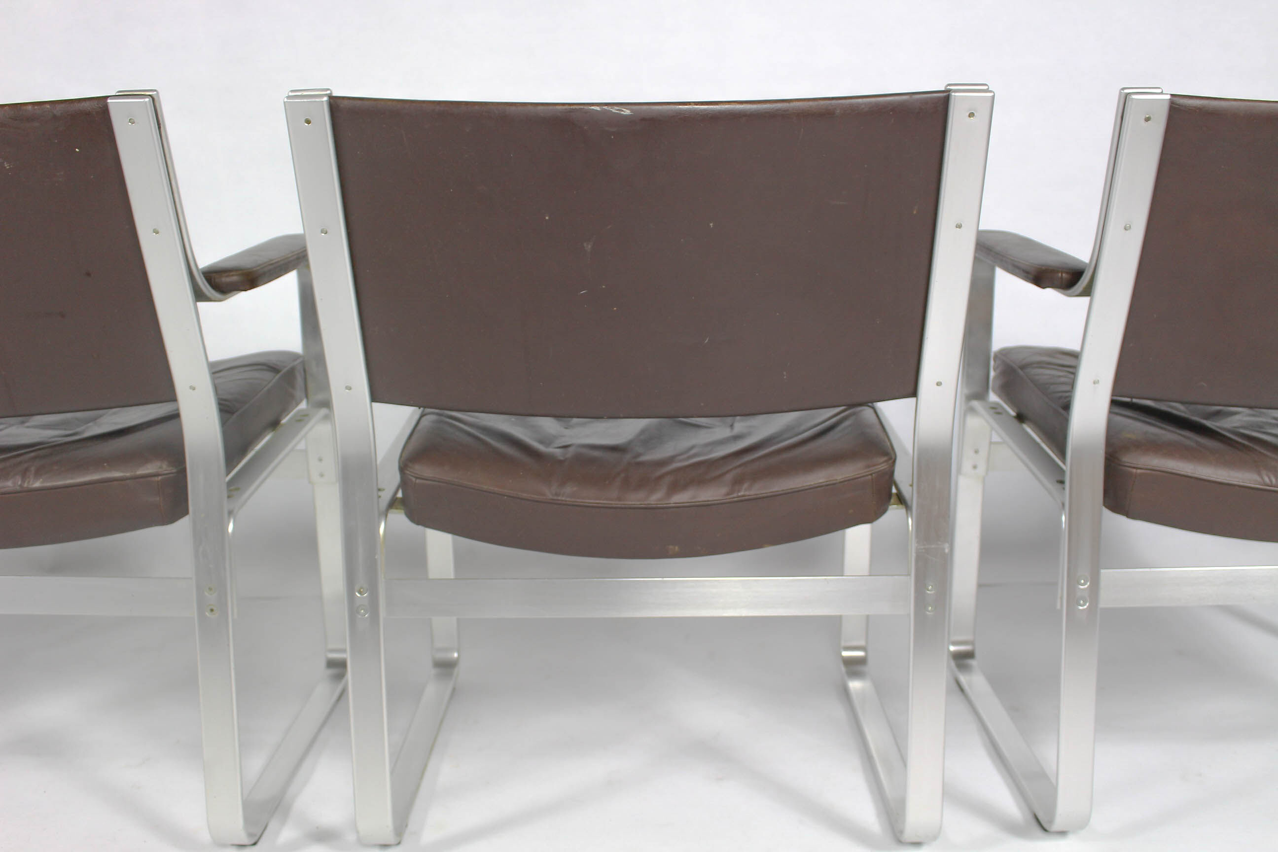 Swedish Mid Century Leather And Aluminum Armchairs By Karl Erik Ekselius For Joc Vetlanda, Set Of 4