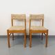 Pair of vintage Baumann chairs in wood and fabric from the 70s