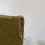 Olive green upholstered armchairs with studs