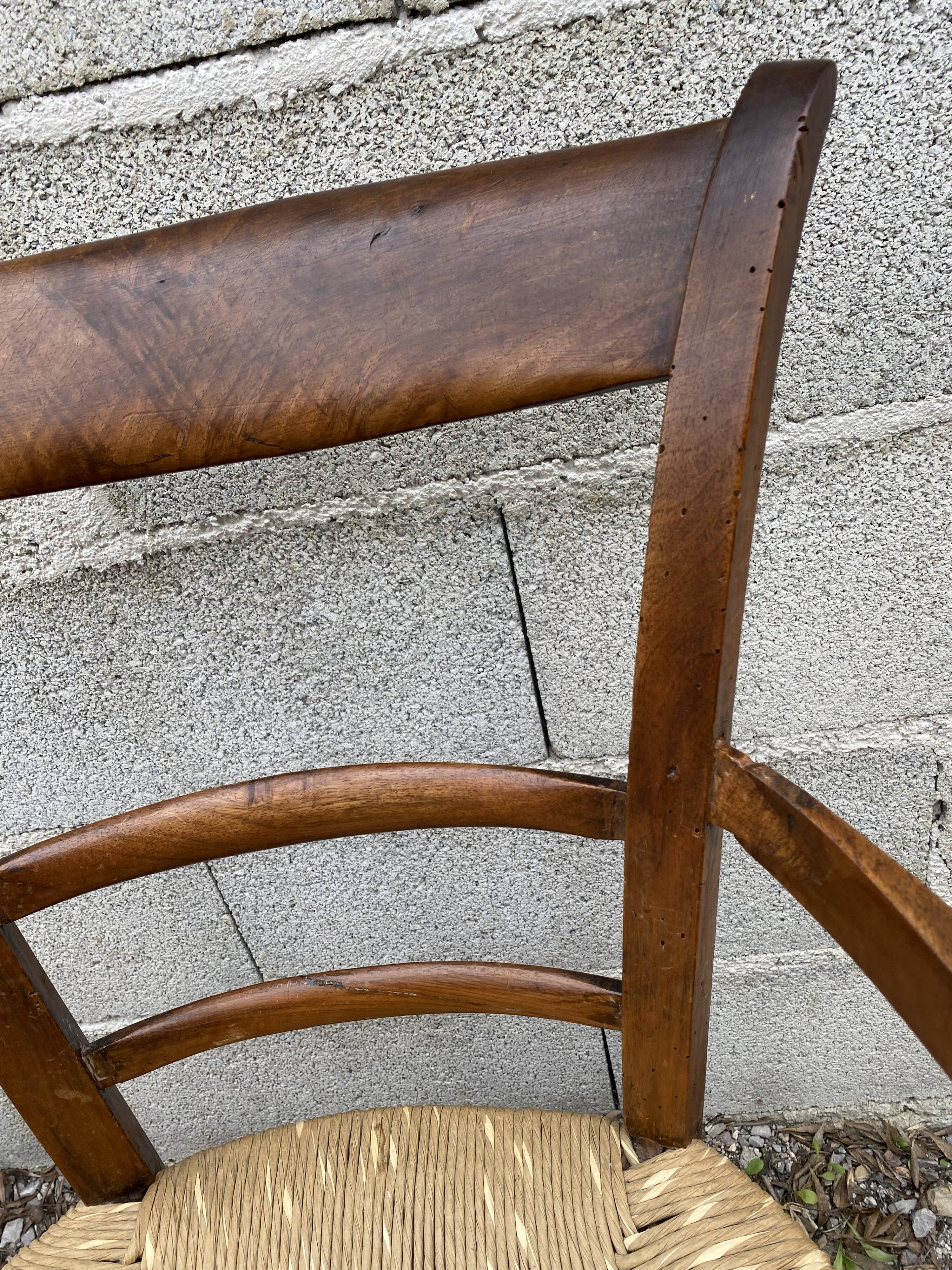 Antique straw armchair