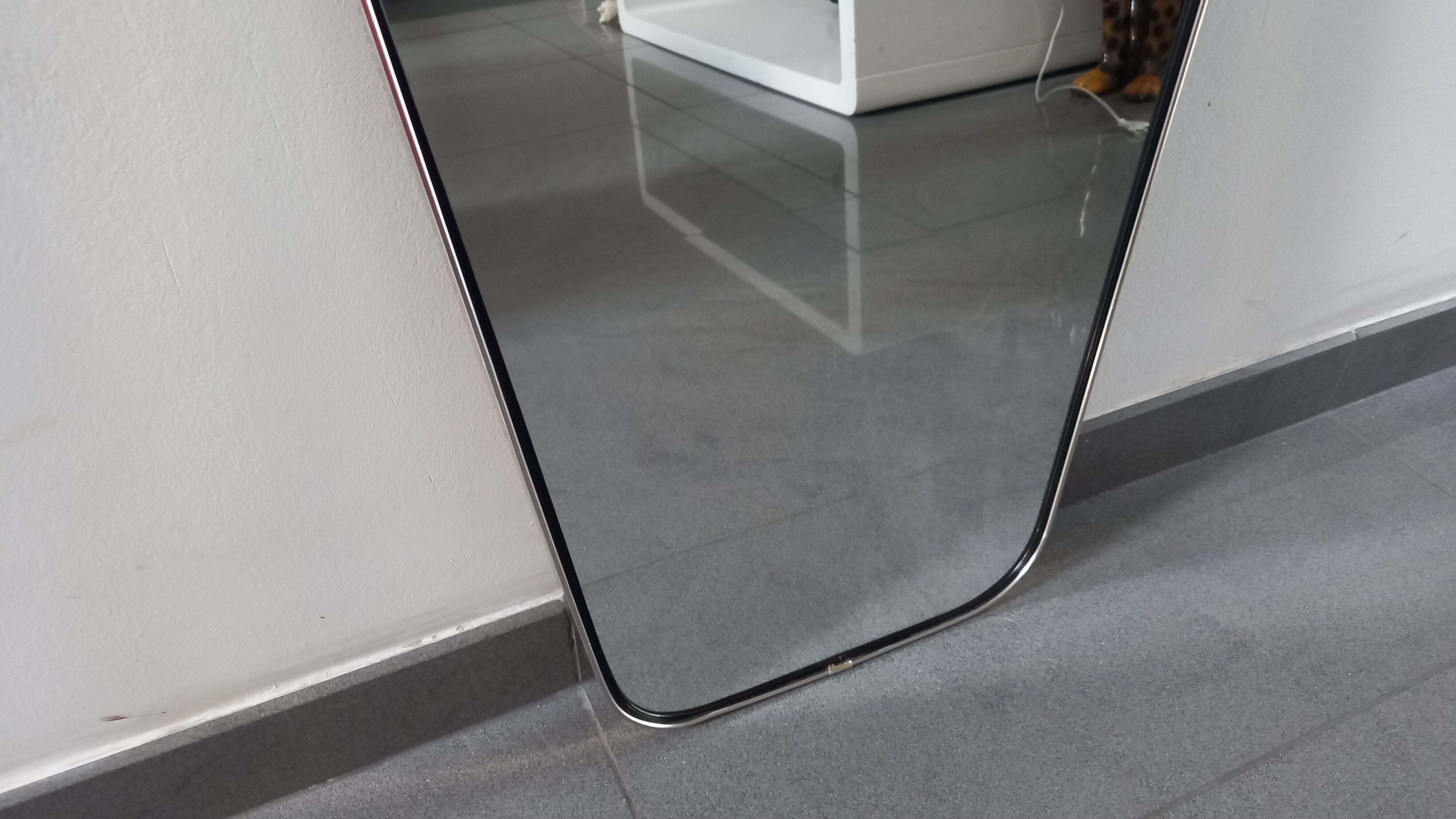 Asymmetric mirror