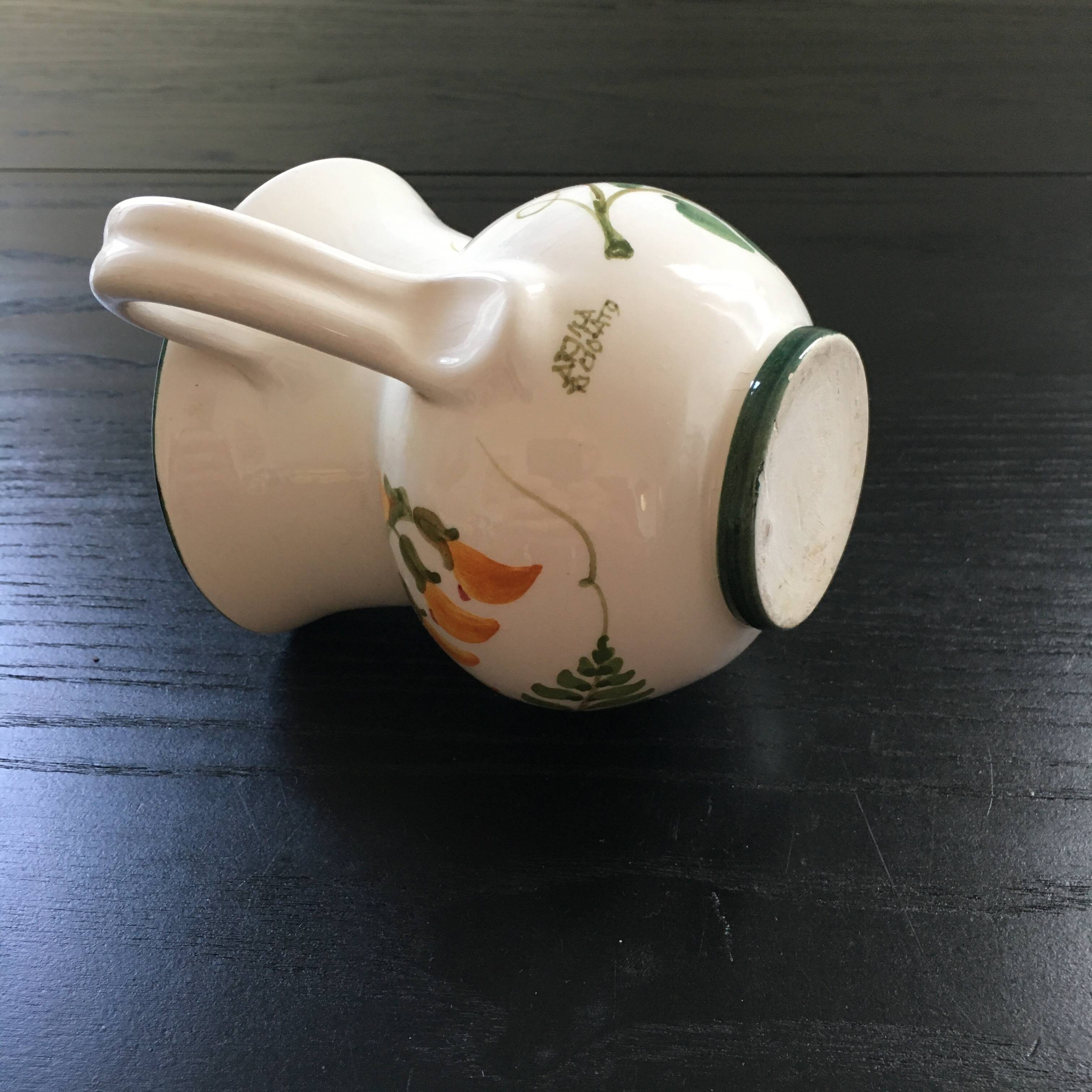 Small pitcher with floral decoration