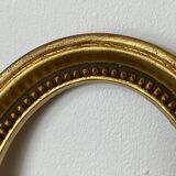 Ancien cadre en bois doré feuille d’or