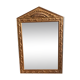 Mirror in gilded wood with a triangle pediment decorated with half sunflowers