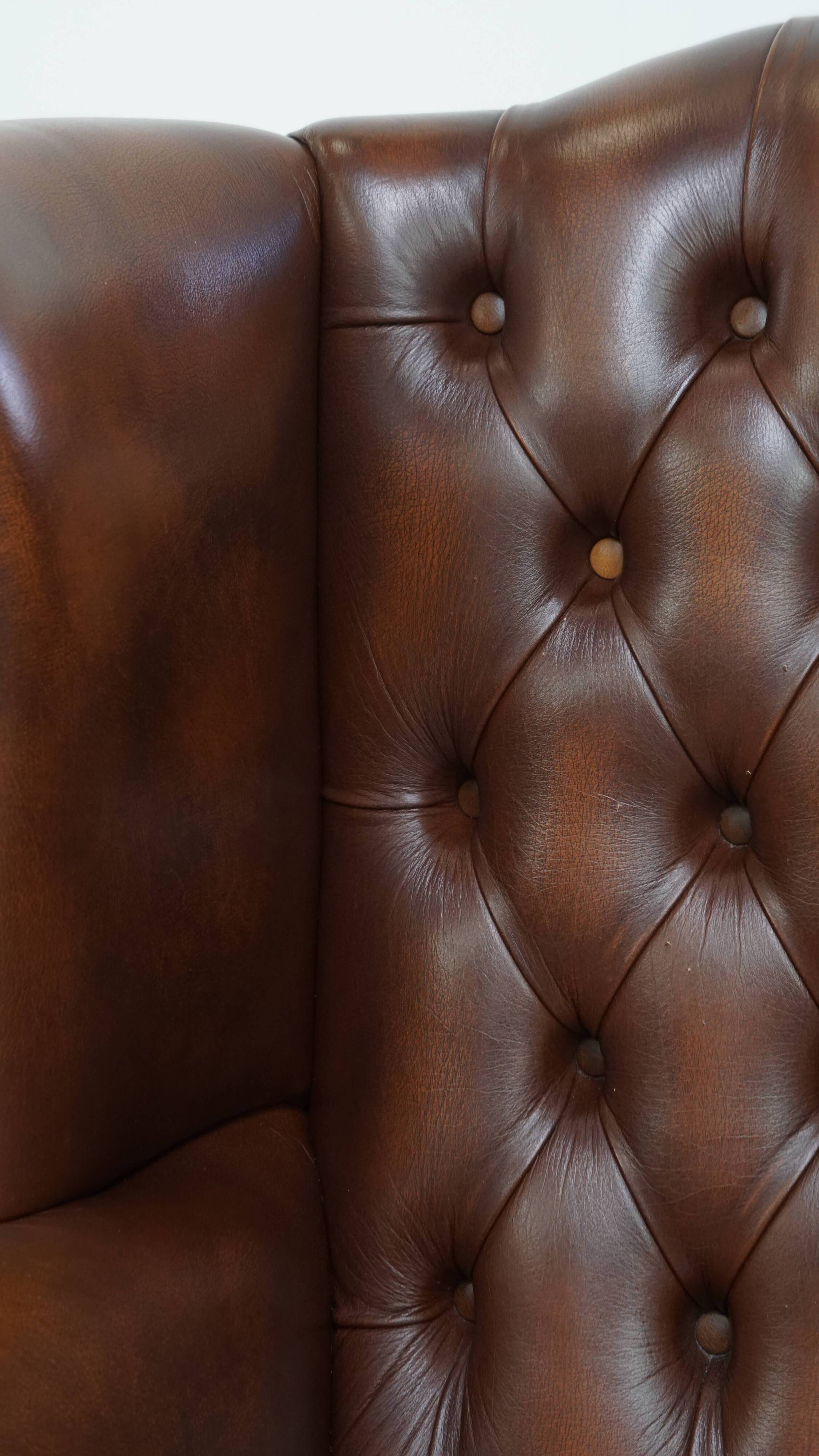 Chesterfield wing chair in dark brown English cowhide