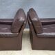 Pair of chocolate leather lounge chairs