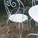 Mategot-style perforated wrought iron garden furniture with table and armchairs