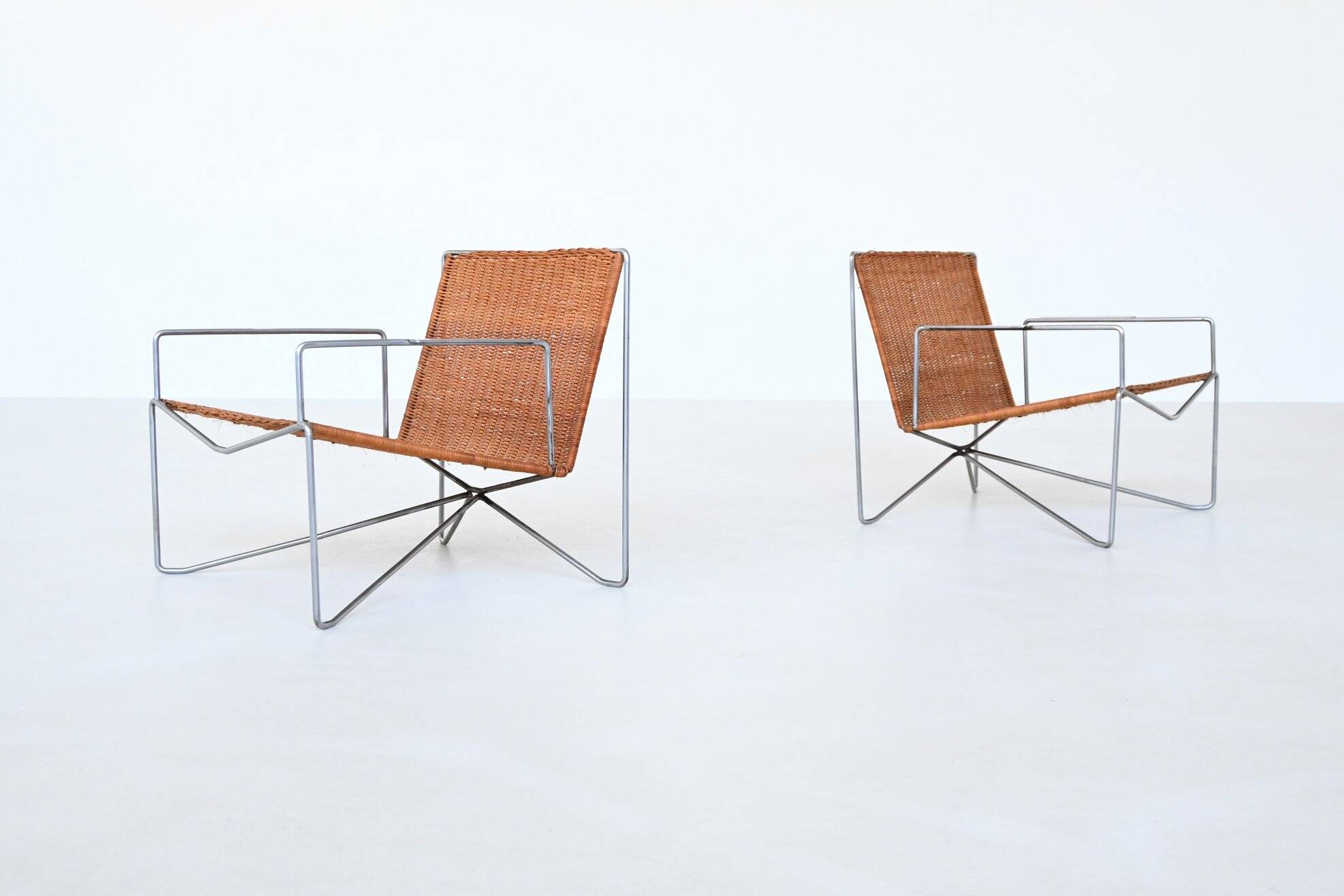Pair of lounge chairs steel and rattan Gelderland The Netherlands 1964