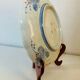 Imari porcelain plate from Japan, 19th century, hand-painted decoration.