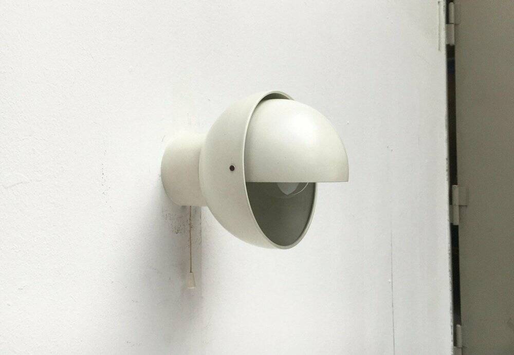 Mid-century Dutch space age wall lamp by Radboud Van Beekum for Raak, 1960s.