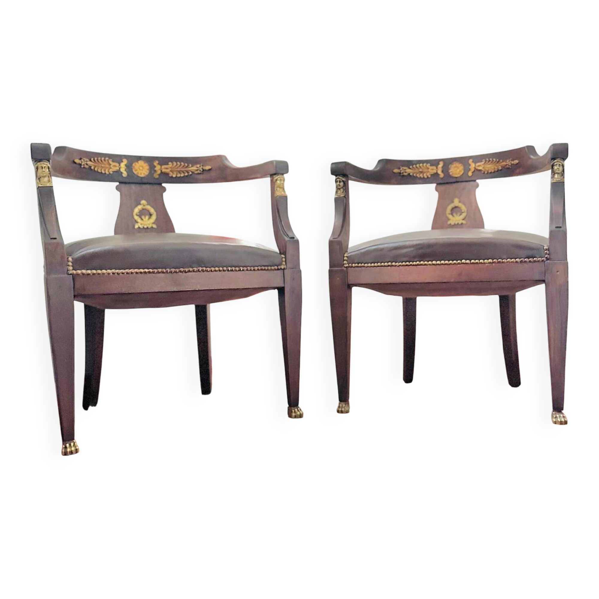 Pair of Empire armchairs in bronze and mahogany.