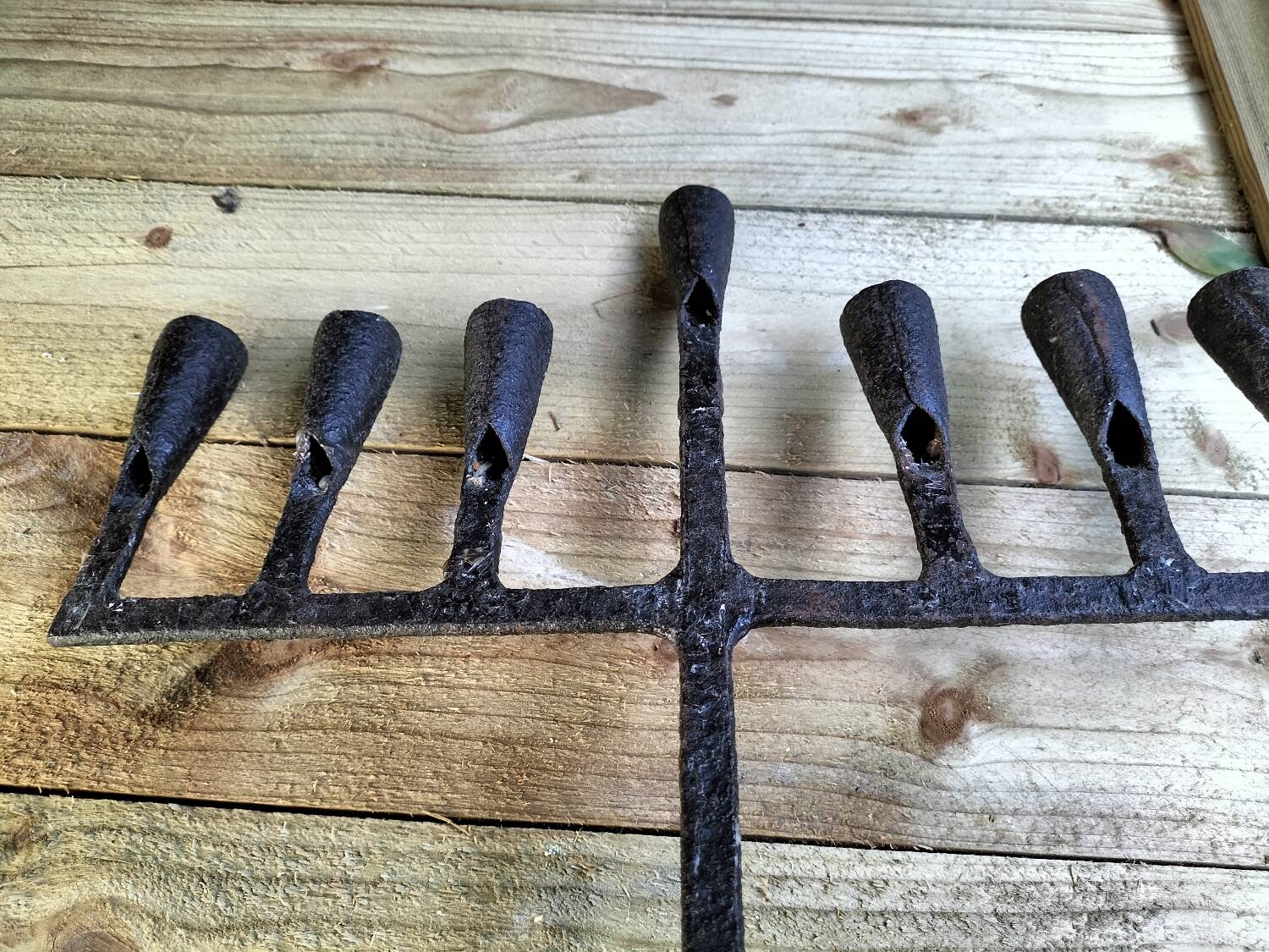 Brutalized wrought iron candle holder