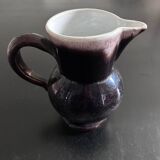 Antique tilted pitcher