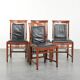 Elegant set of four black cowhide and wooden Art Deco dining chairs