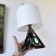Pair of ceramic lamps in free-form triangle shape