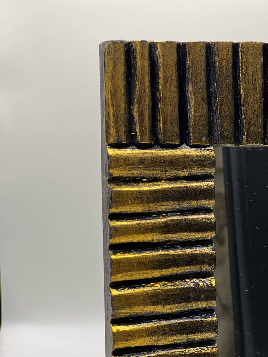 Art deco mirror in gilded wood