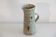 Sandstone pitcher by Gustave Tiffoche